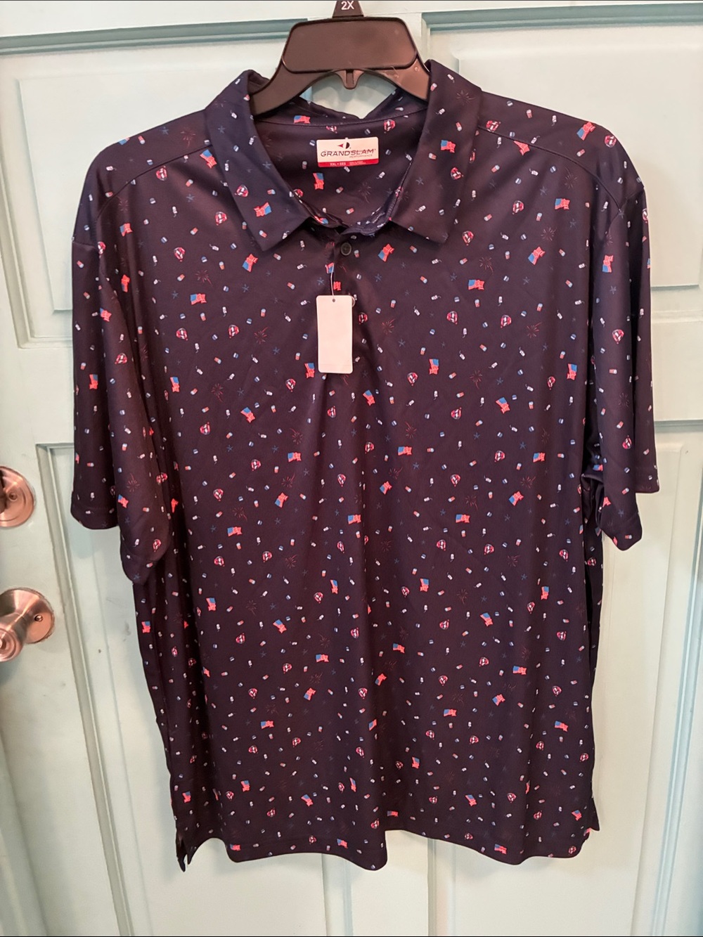 Grand Slam Navy Short Sleeve Button-Down Shirt with Red & Light Blue Print
